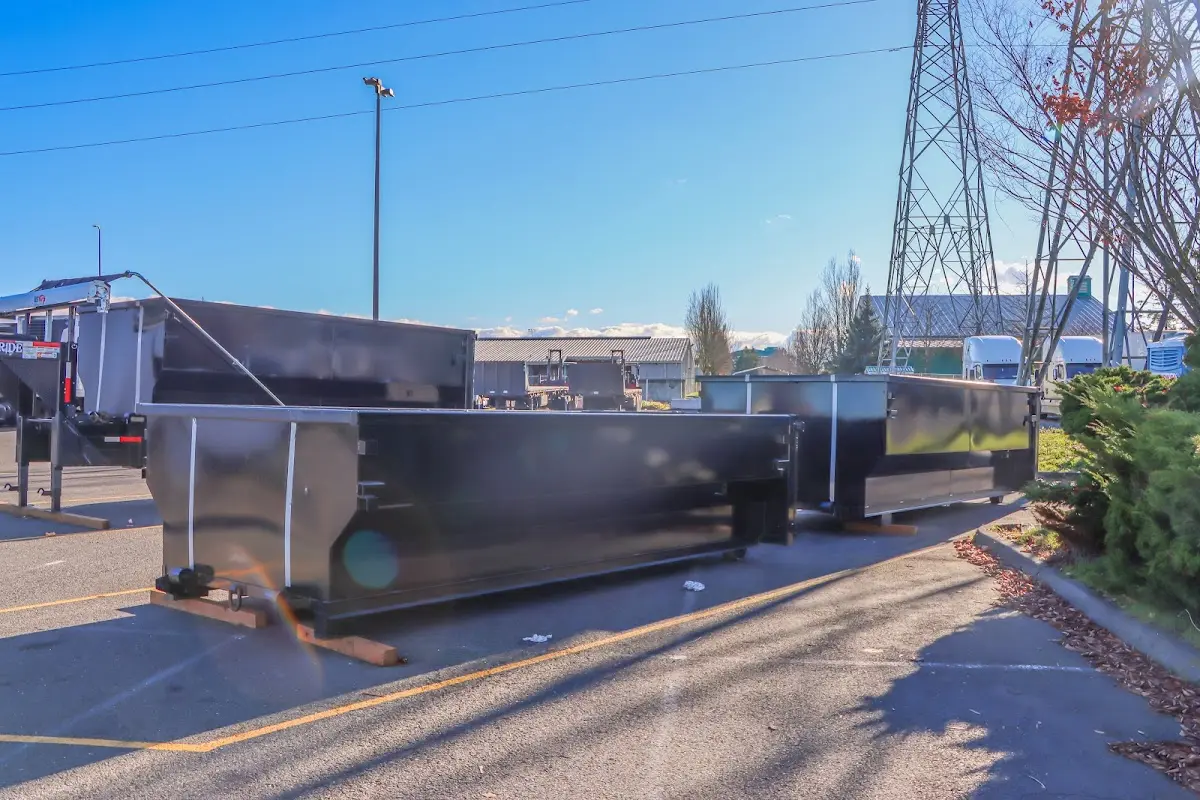Roll-off dumpster ready for waste disposal at job site for 2 Yard Dumpster Rental in North Madison